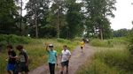 PALS boys clean up litter outside the school and in the forest