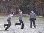 Boys flying their radio controlled glider in the first snow of the year.