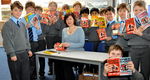 SOPHIE McKENZIE signs her books for the boys