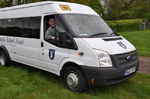 Mr Grant in a bus with his initials on the number plate!